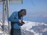 Checking email on the top of Piz Boè, March 2011